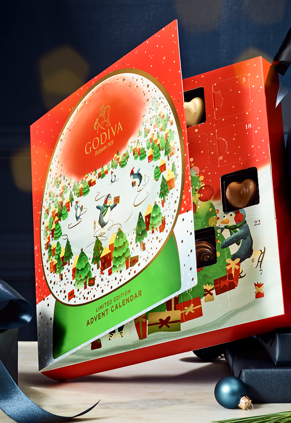 Godiva chocolate advent calendar with festive design on a dark background
